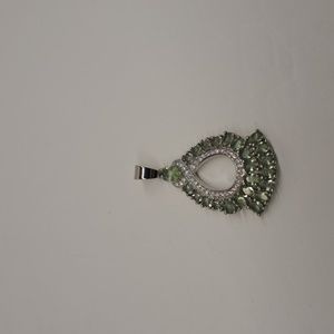Silver pendant with beautiful green stones and cz